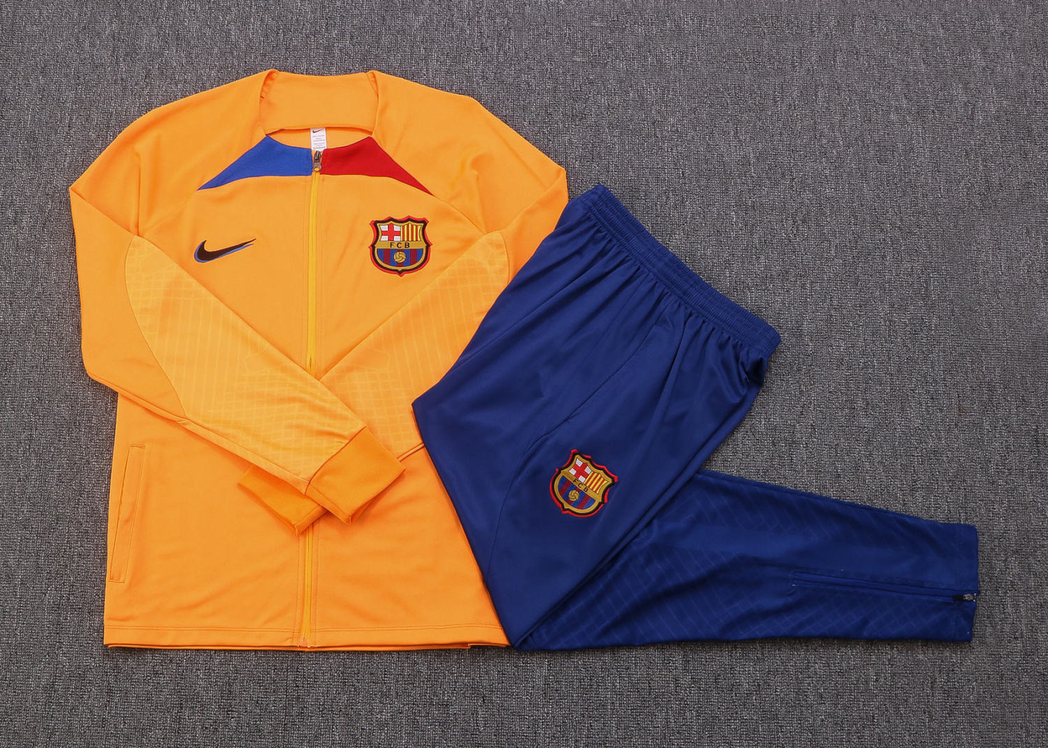 Barcelona Soccer Jacket + Pants Orange 2022/23 Youth